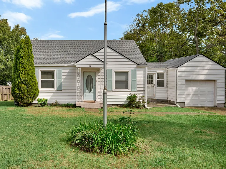 Photo 2. Front of house