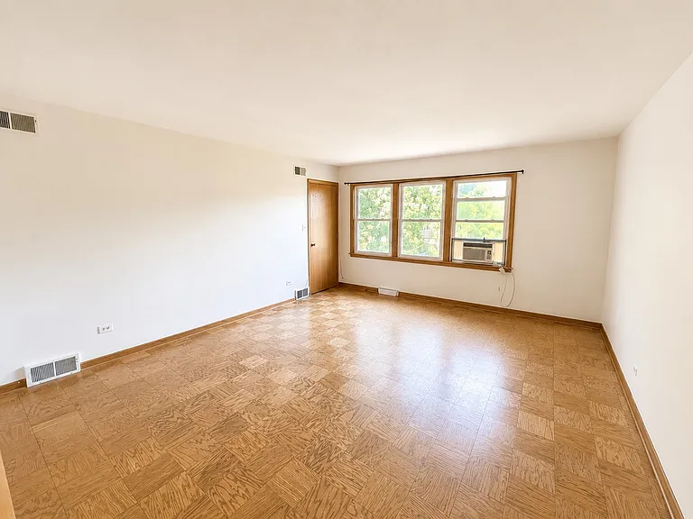 Living Room Shot #2 (Featuring Main Entrance)