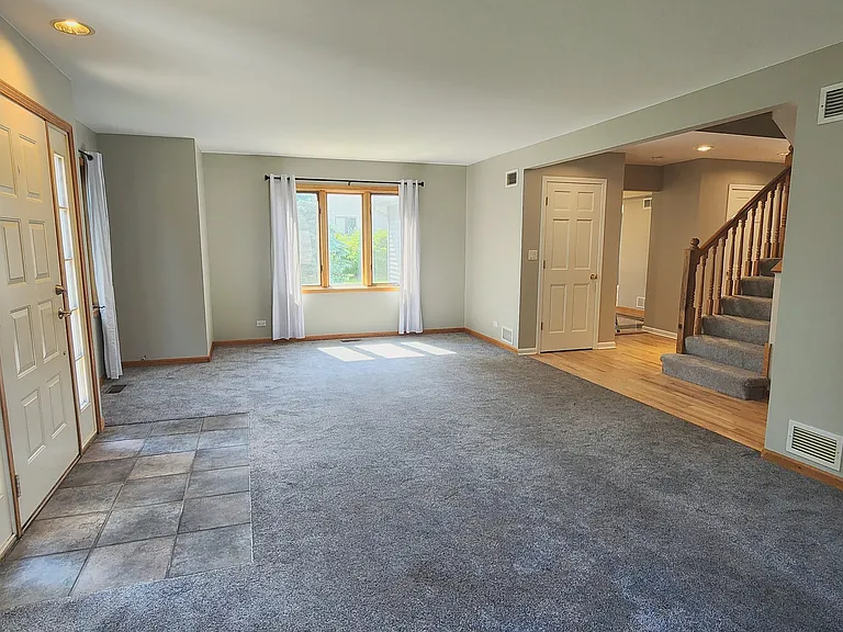 Formal living room - view 2. The walls are Revere Pewter (a light greige). This picture makes them look green, but they are not green.