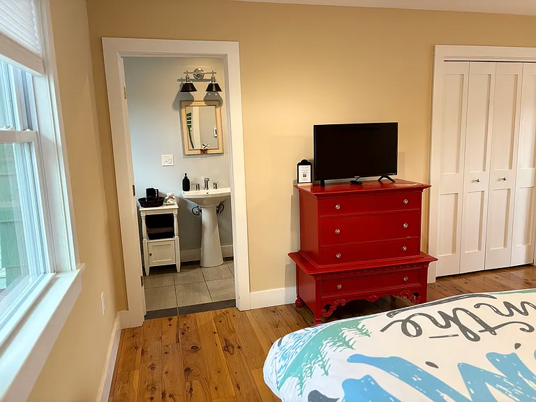 Master: View looking from the bed to the private bathroom