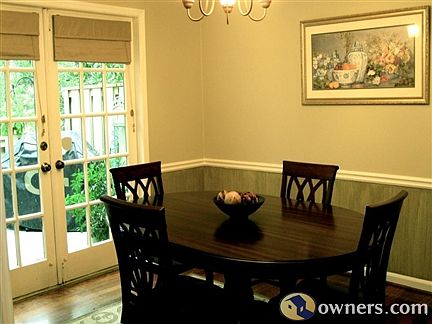 DR w/ french doors that open onto patio