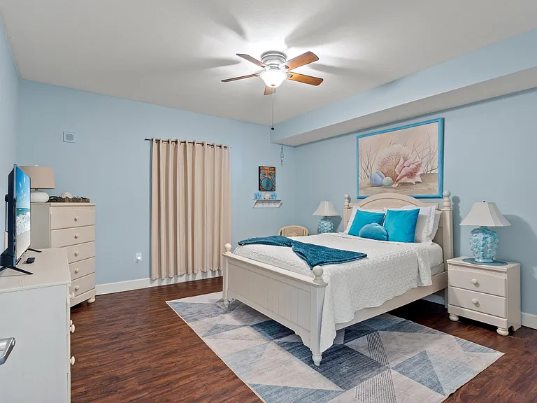 The first guest bedroom has a Queen bed. There is also a TV in the bedroom ready for your streaming apps.