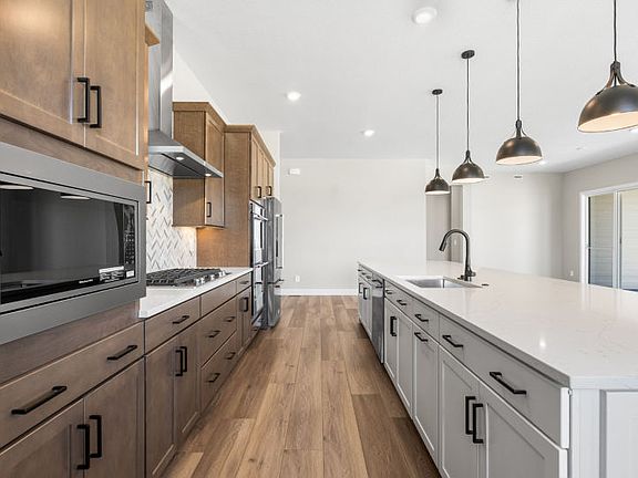 Beautiful chef s kitchen featuring a gas range