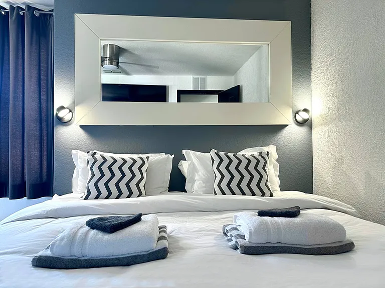 Choose between 1 King Bed or 2 Twin Beds and relax on the cozy daybed for a restful stay.