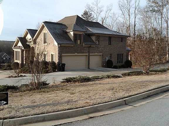 3-Car Garage with wide driveway