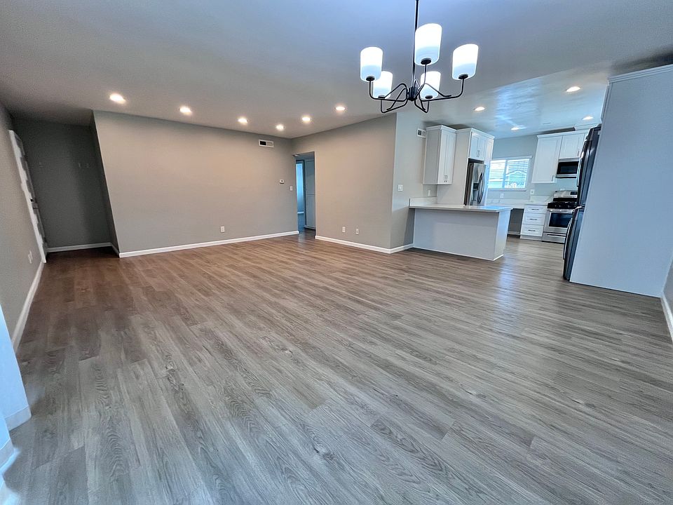 View from corner, by sliding door to balcony.