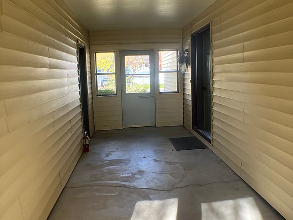 Breezeway between garage and front door
