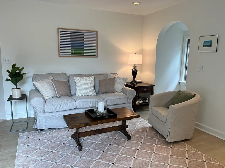 New furniture, rug and flooring make the living space clean and comfortable.