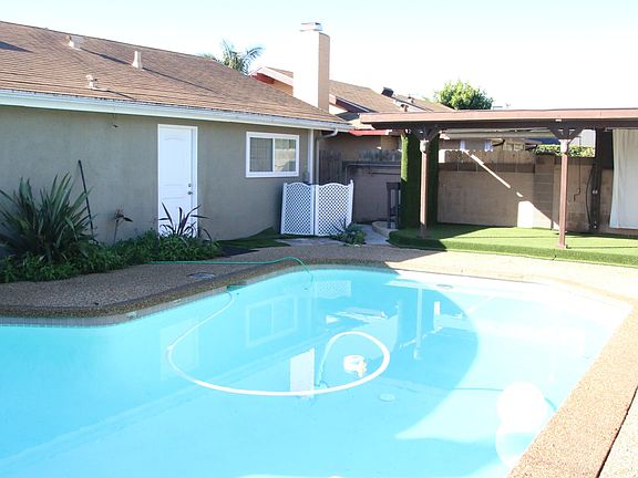 Pool and Covered "hang out" area next to pool.