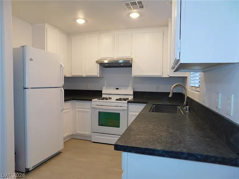 7859 Treasure Ship Ave — Photo 9