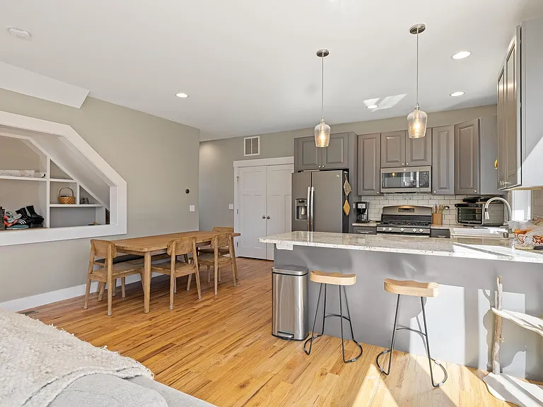 Open floor plan main floor (dining and kitchen)