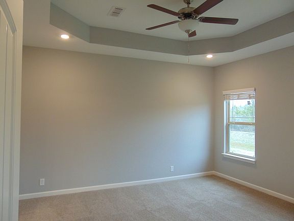 Owners Suite with Trey Ceilinfg and Fan. File Photo