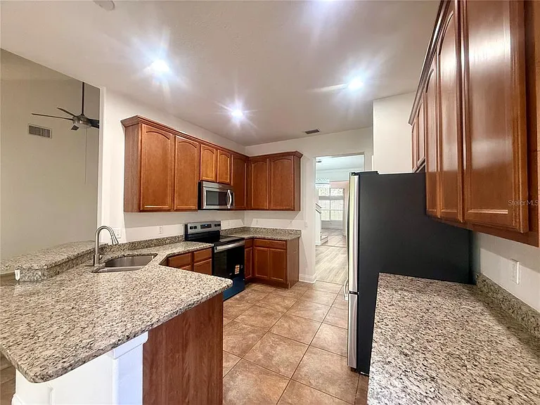 6984 Brescia Way — Photo 8