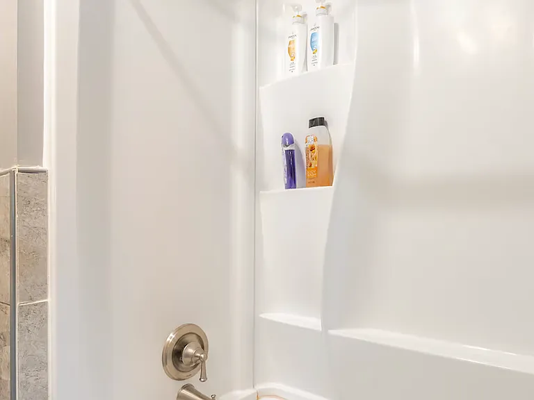 Bathroom with tub and stand up shower