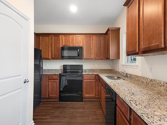 The kitchen comes with a full suite of energy-efficient appliances.