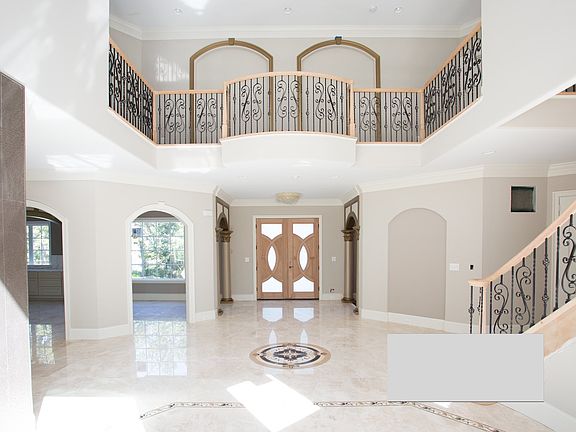 Foyer by Botero Homes