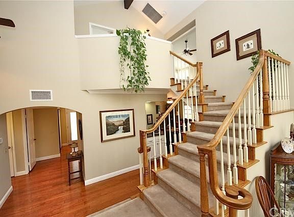 Open design and large archway to main floor bedrom