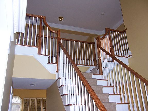 Butterfly foyer w/over hang