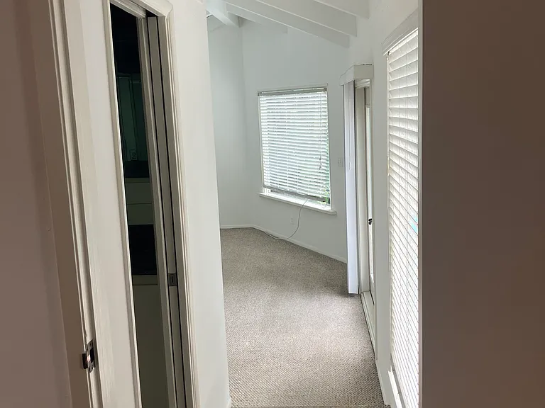 hall view into bedroom three