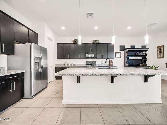 5th image of 9320 W MEADOWBROOK Avenue