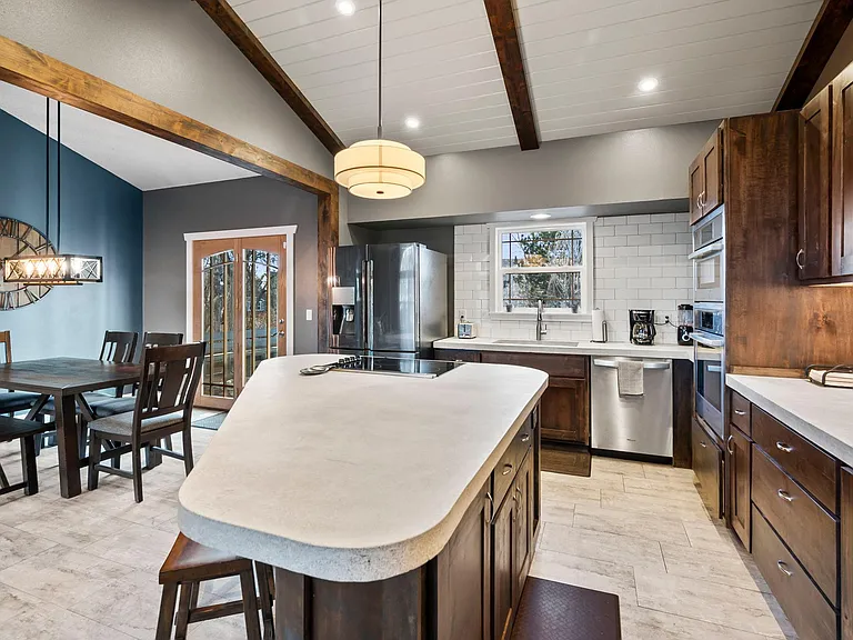 The open layout offers the perfect space for culinary adventures and shared meals with loved ones.