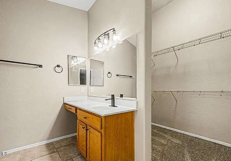 23765 W Desert Bloom St — Photo 18