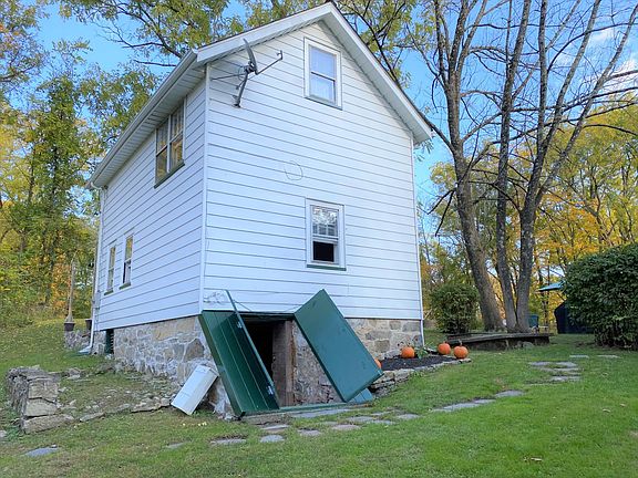 Access to Basement with Storage, extra refrigerator and washer / dryer