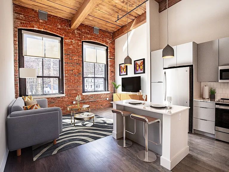 Open concept floor plan with large and inviting windows