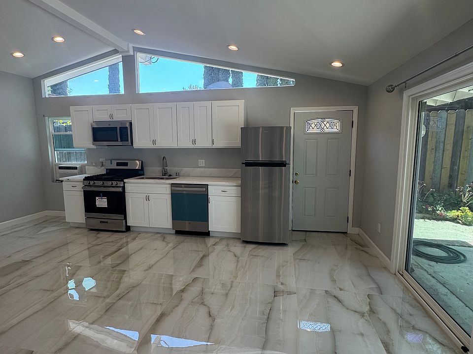 living area and kitchen