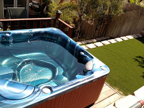 Terraced back yard with jacu