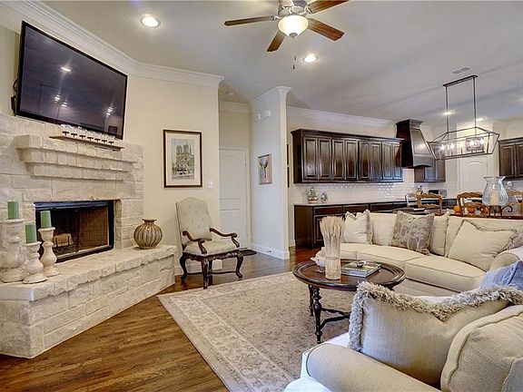 Large open concept living area with beautiful hardwood floors!