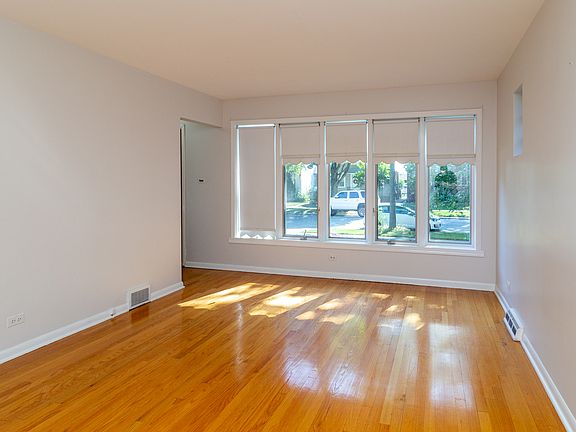 5th image of 4232 N Newland Ave