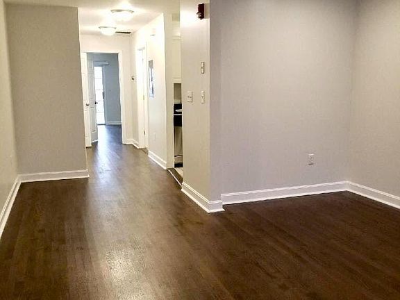 Beautiful espresso floors, white crown molding