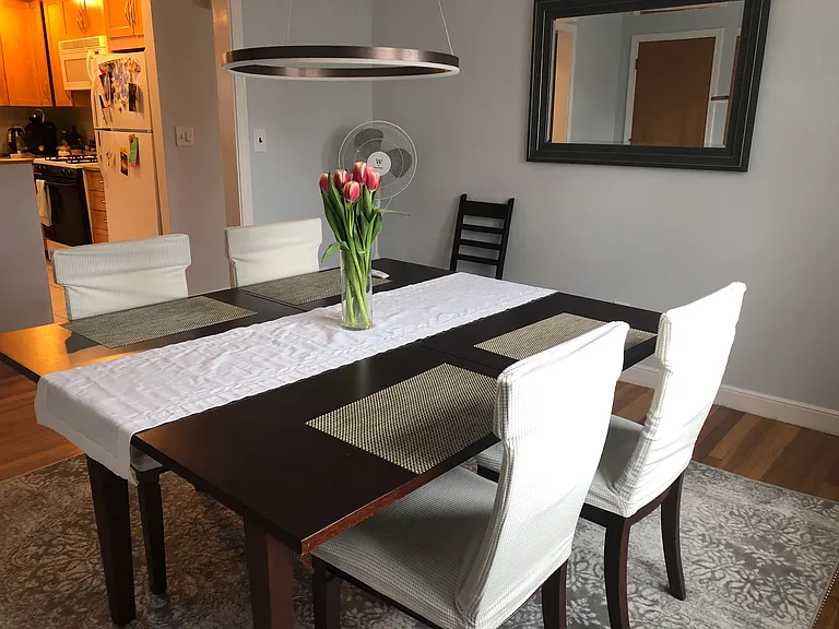 Formal dining room can easily be converted into office space.