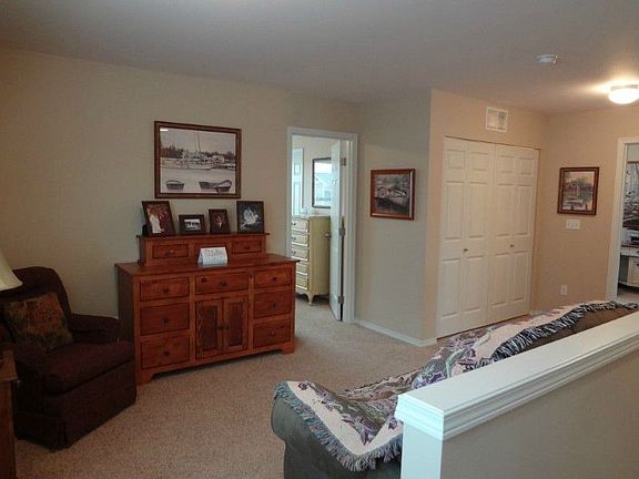 Loft area could be used as Family room or sitting area. Laundry on upper floor with bedrooms that has never been used (currently used as storage closet. The seller had the garage plumbed for washer and dryer so its your choice!