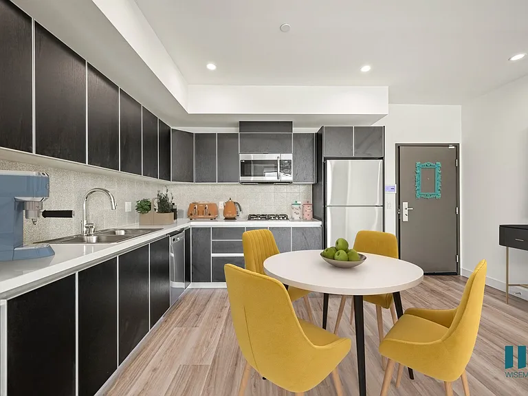 Kitchen with Stainless-Steel Appliances and Ample Cabinet Storage - Maple Floor Plan