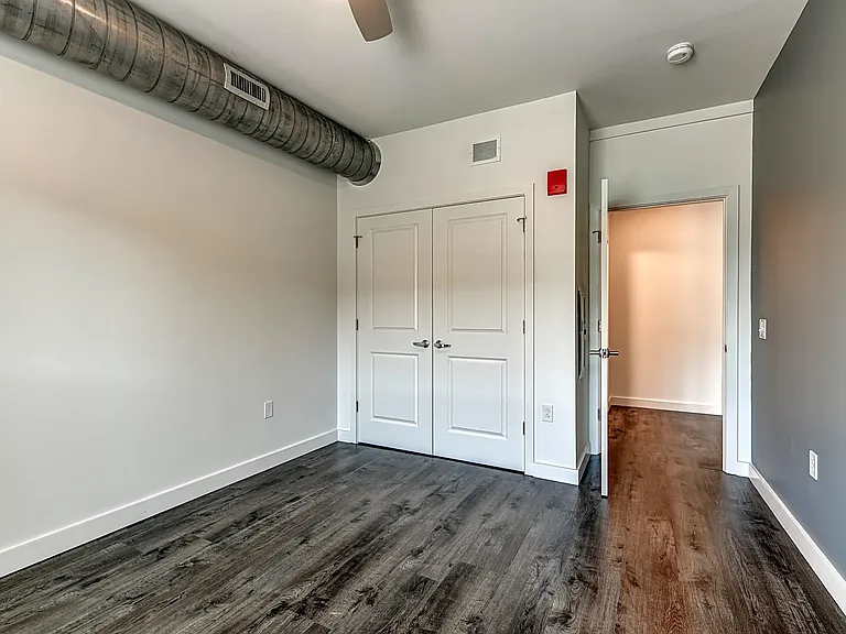 Bed Room / Features Large Windows and a Ceiling Fan
