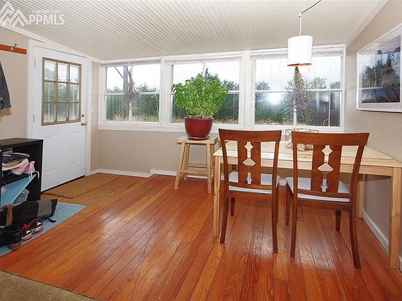 Entry way has hardwood flooring and lots of natural light.