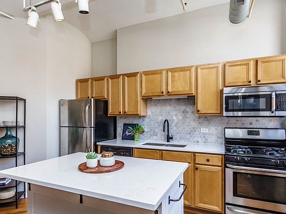 Large island with stools is included with the sale