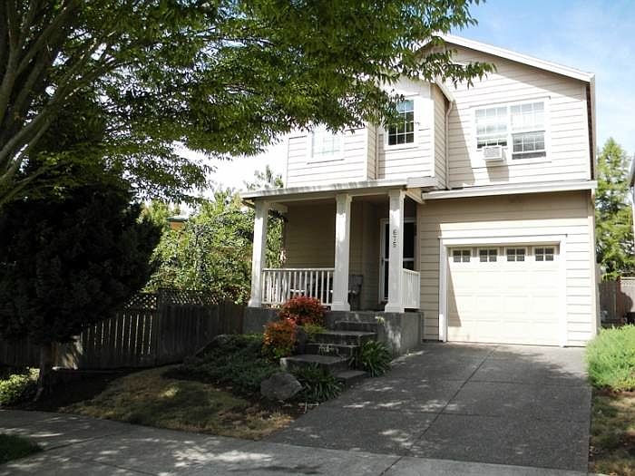 1st image of 675 NW Tree Haven Dr