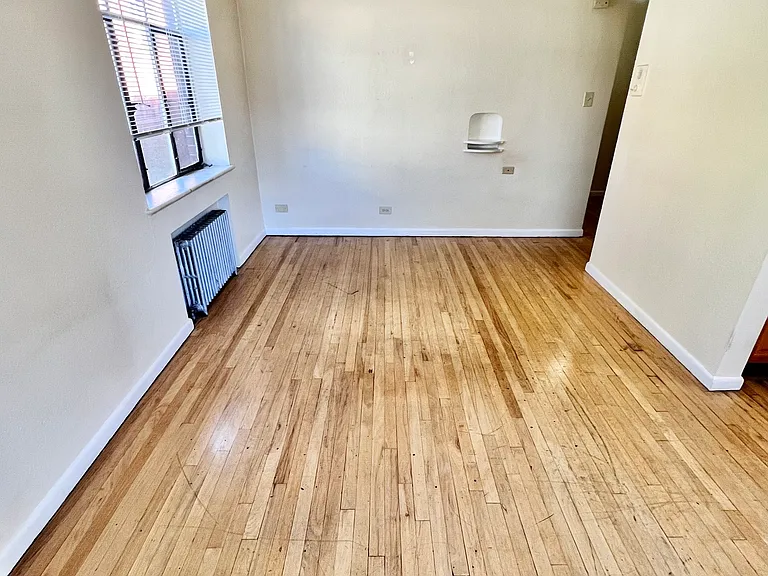 Experience the warmth of this inviting space with gleaming hardwood floors and abundant natural light. Experience the warmth of this inviting space with gleaming hardwood floors and abundant natural light.