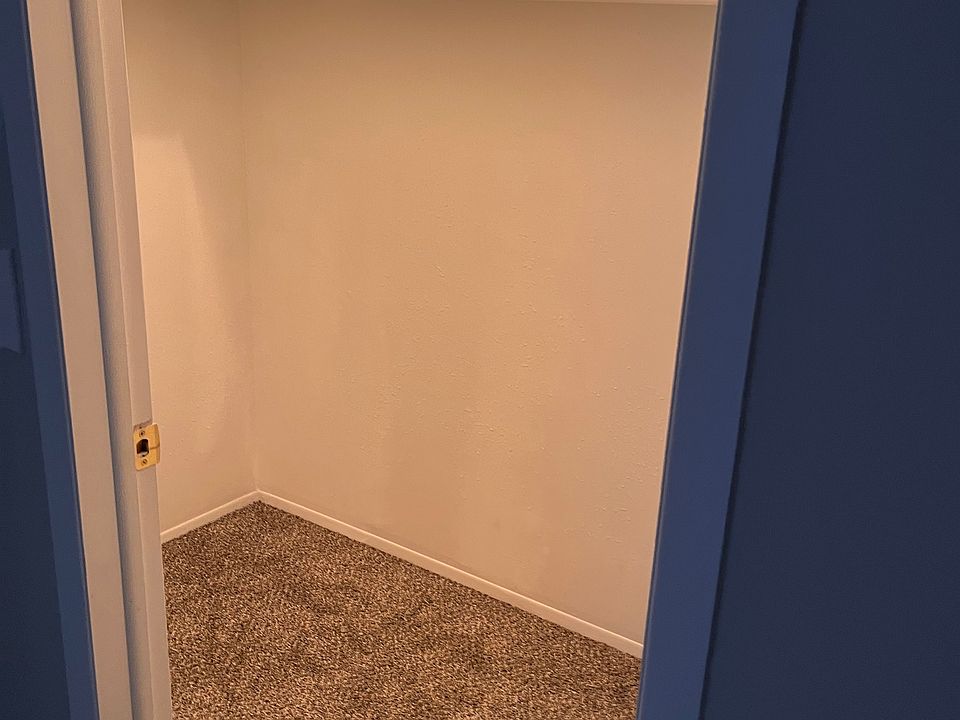 Primary bedroom walk in closet