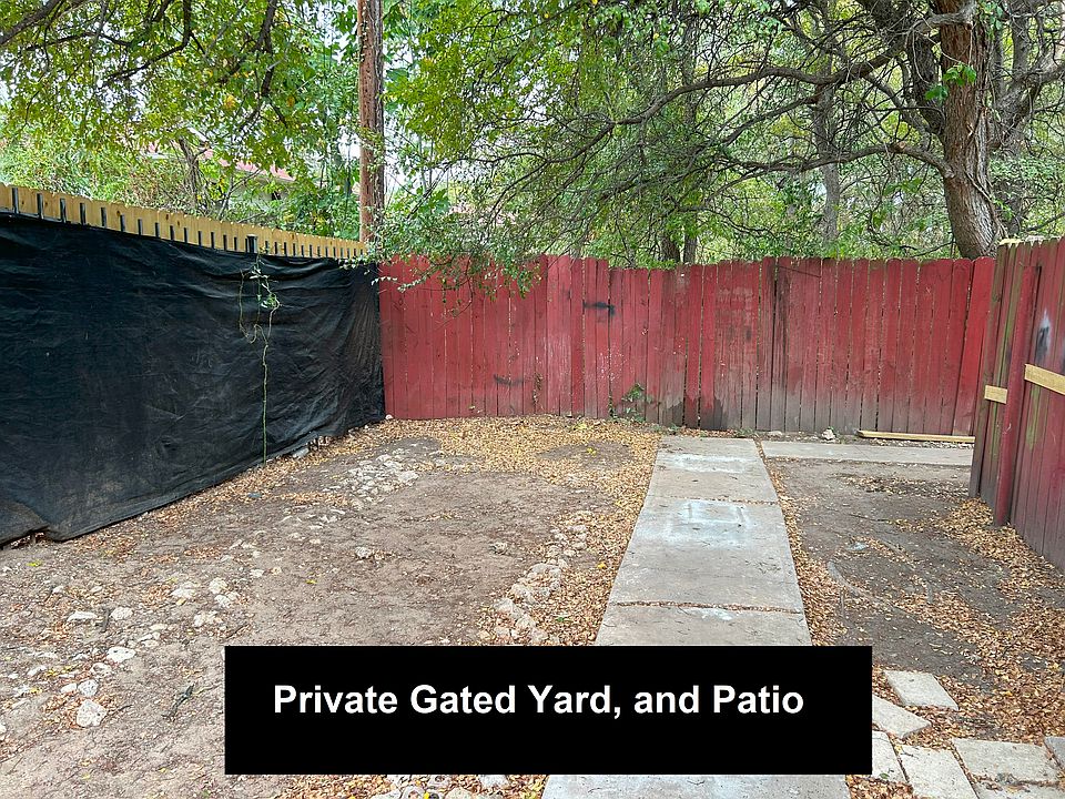 Full yard behind gate. Also private patio enclosure inside of the yard. Double Gated.