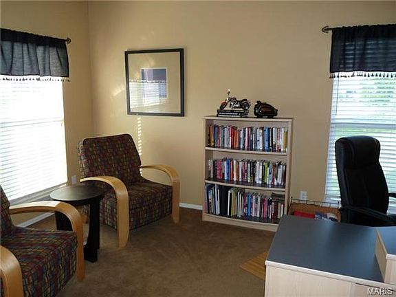 Home office space located off entry foyer.