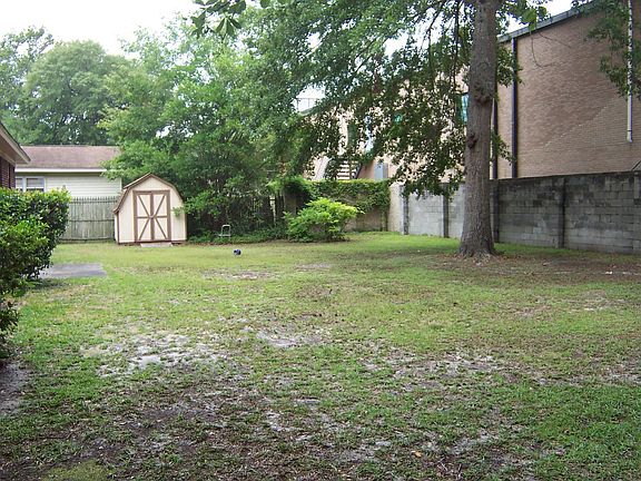 back yard with storage shed