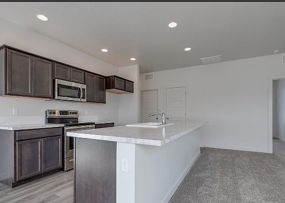 flooring now exists under the countertop seating area