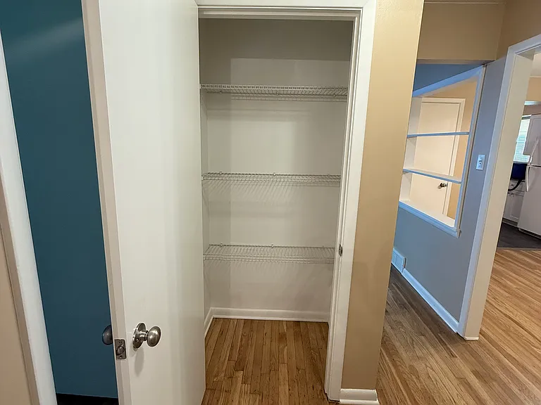 Linen closet outside of Bathroom 1