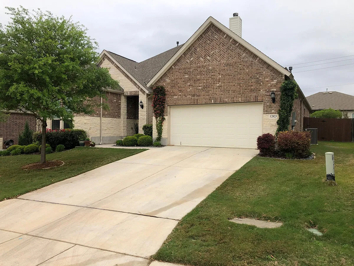 Front of house, from driveway - 12823 Florianne