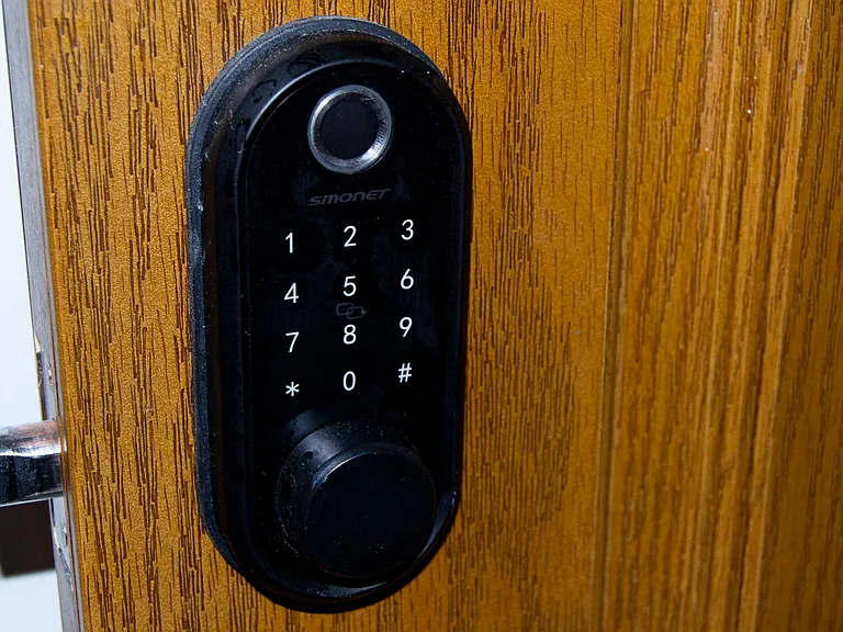 Smart locks on front & back exterior doors. Can use fingerprint, code, or fab to enter.