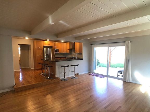 Family room looking into kitchen